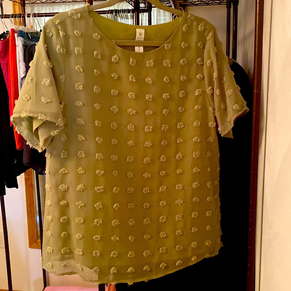 Celery green shirt with puff ball dots